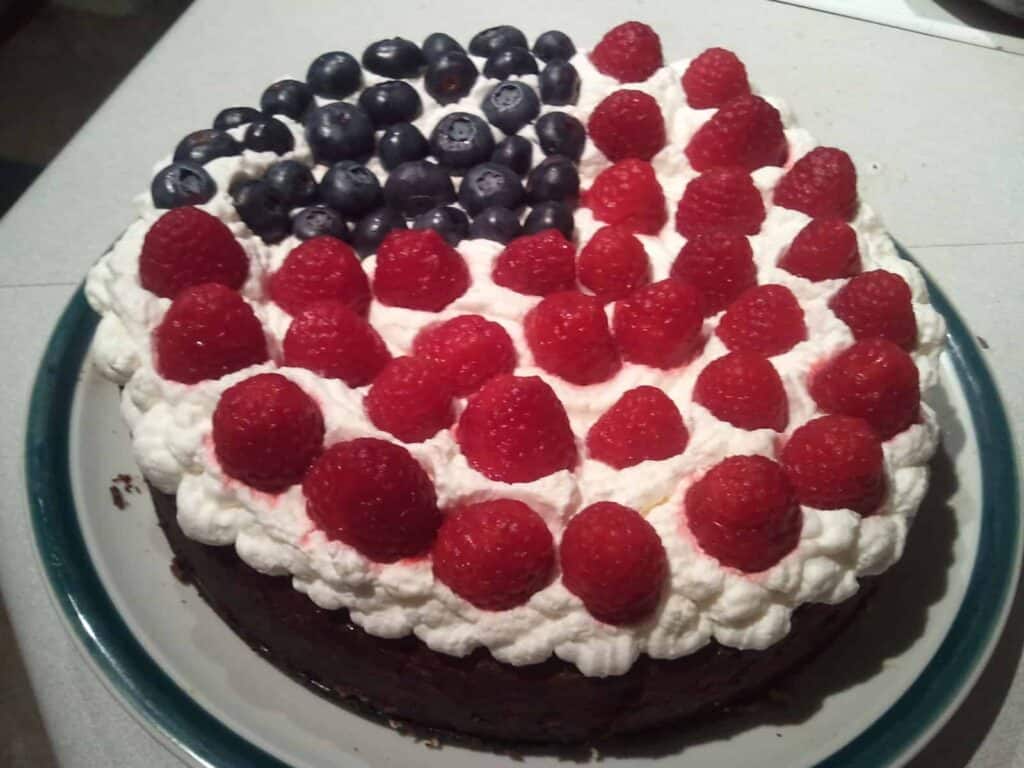 foruth of july berry cheesecake on a plate