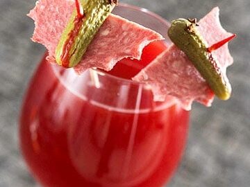 batty bloody mary cocktail with salami pickle bats