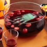 bloody floating hand punch on a Halloween party table