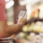 Top Grocery List Apps - Man Using App in Grocery Story