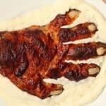 zombie hand meatloaf on a bed of mashed cauliflower