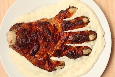 zombie hand meatloaf on a bed of mashed cauliflower