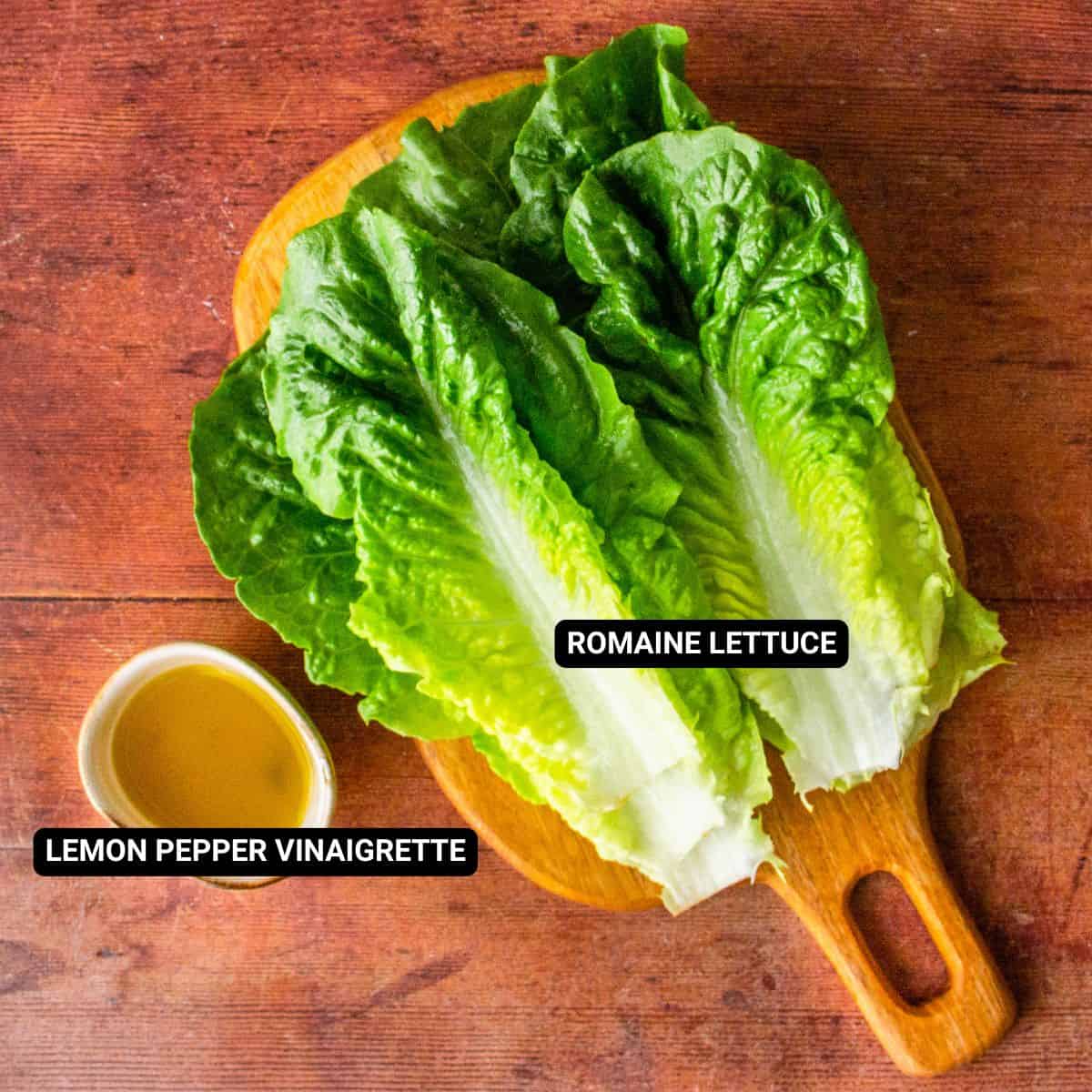 Labeled ingredients for lemon pepper romaine ribs: romaine lettuce and lemon pepper vinaigrette.