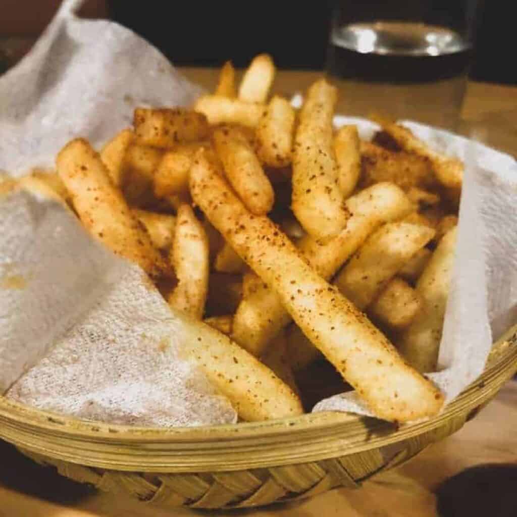 Basket of Celery Root French Fries on Table