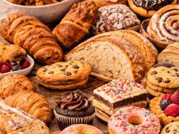 spread of bakery treats on a wooden table