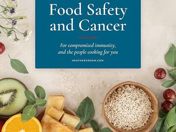 Cover of Food Safety and Cancer guide with fresh fruits and grains.